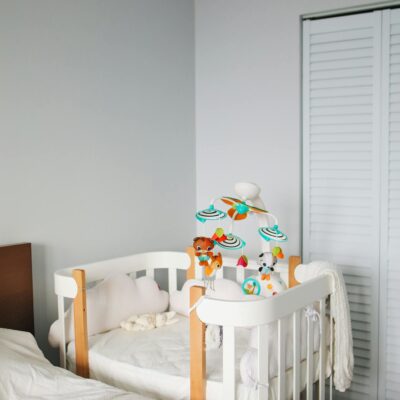 White crib in bright bedroom